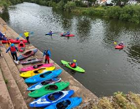 Group kayaking on the river